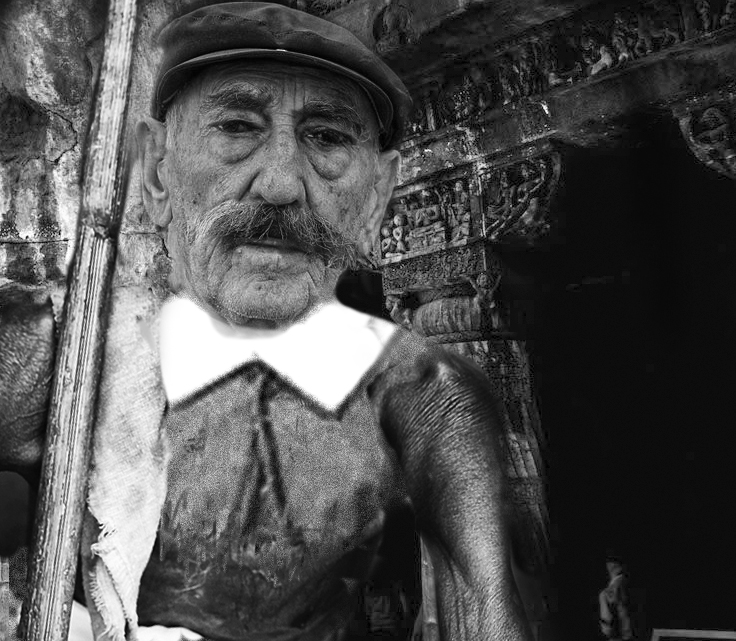 Man in front of caves